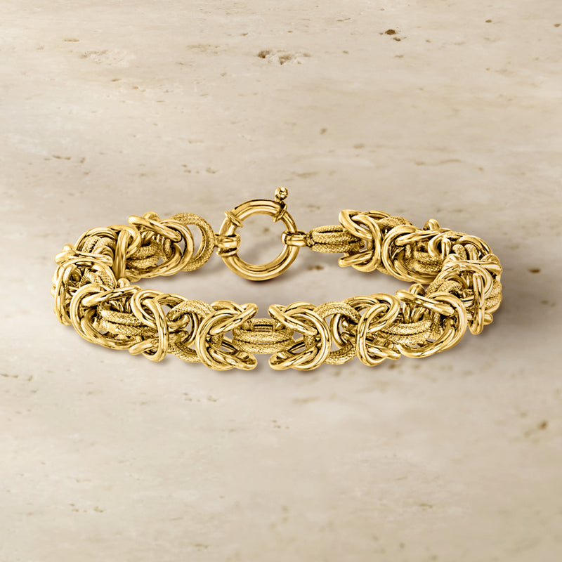 Byzantine chain bracelet, gold-toned, with oval clasp and linked texture