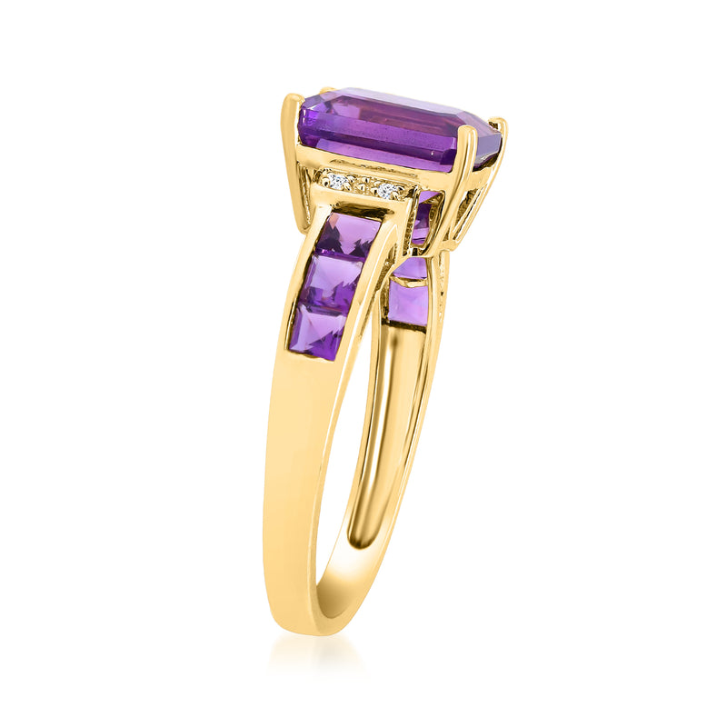 Amethyst ring in 14kt yellow gold with angled prongs, purple center, diamond accents