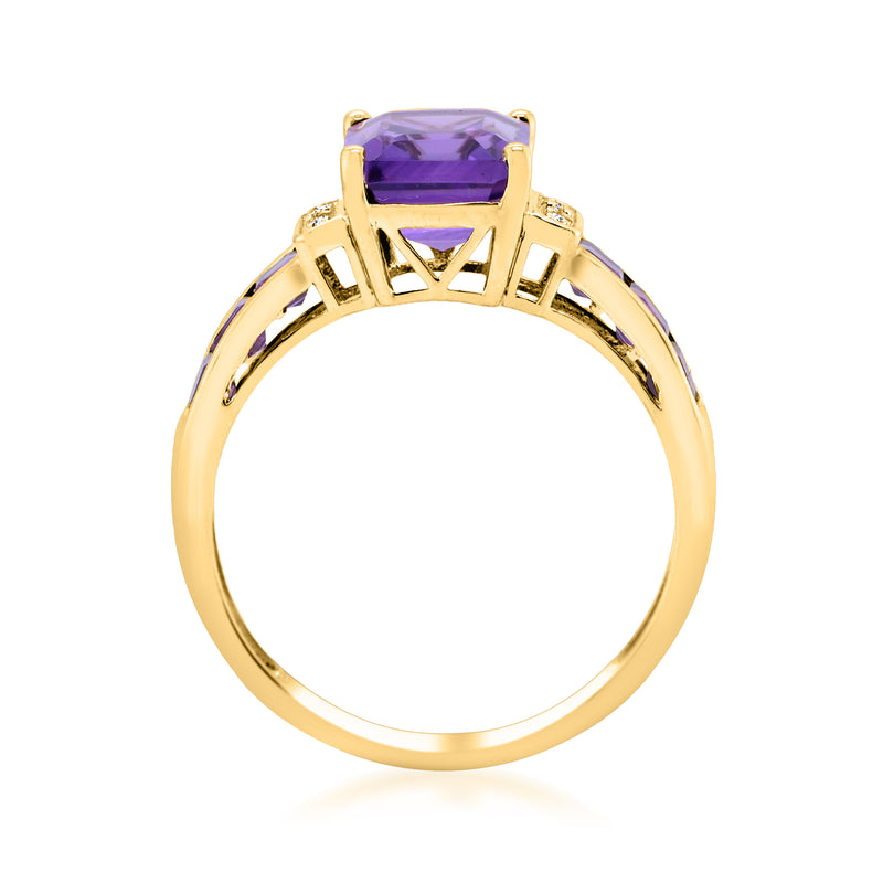 Amethyst ring in 14kt yellow gold with prong-set purple stone and open gallery