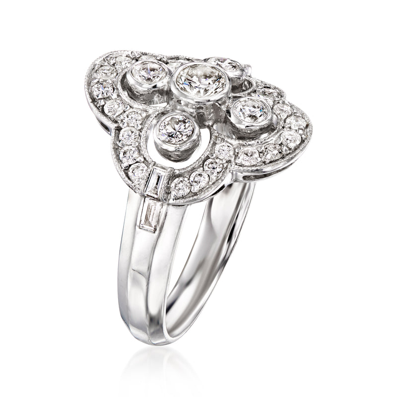 White gold diamond cluster ring with round stones and small baguette accents