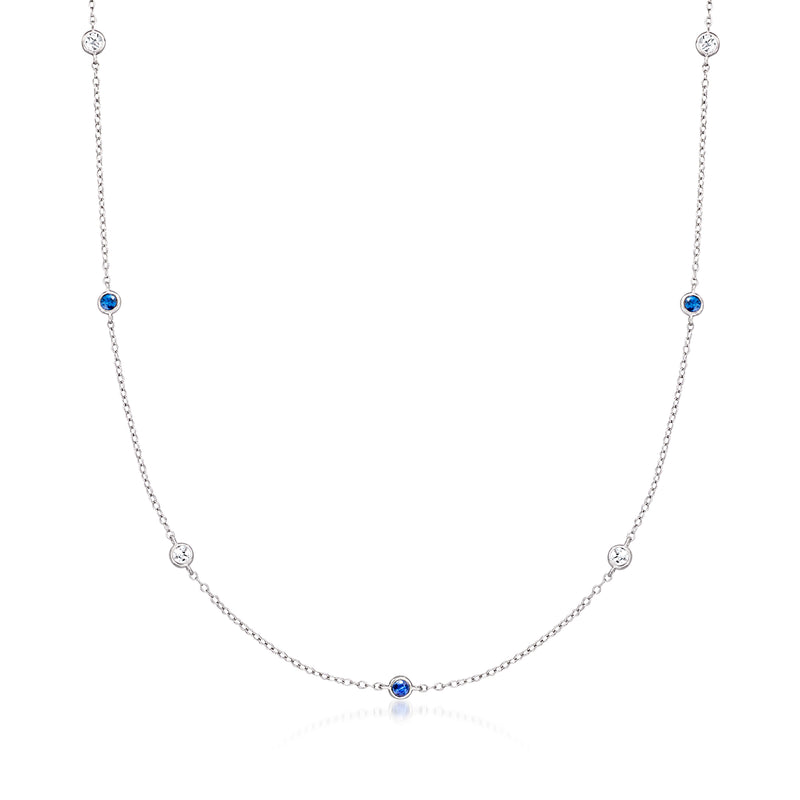 Sterling silver station necklace with three blue sapphire stations and small diamond accents