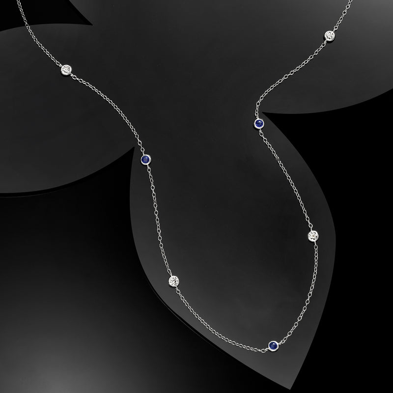 Sterling silver station necklace with three blue sapphire and diamond station details