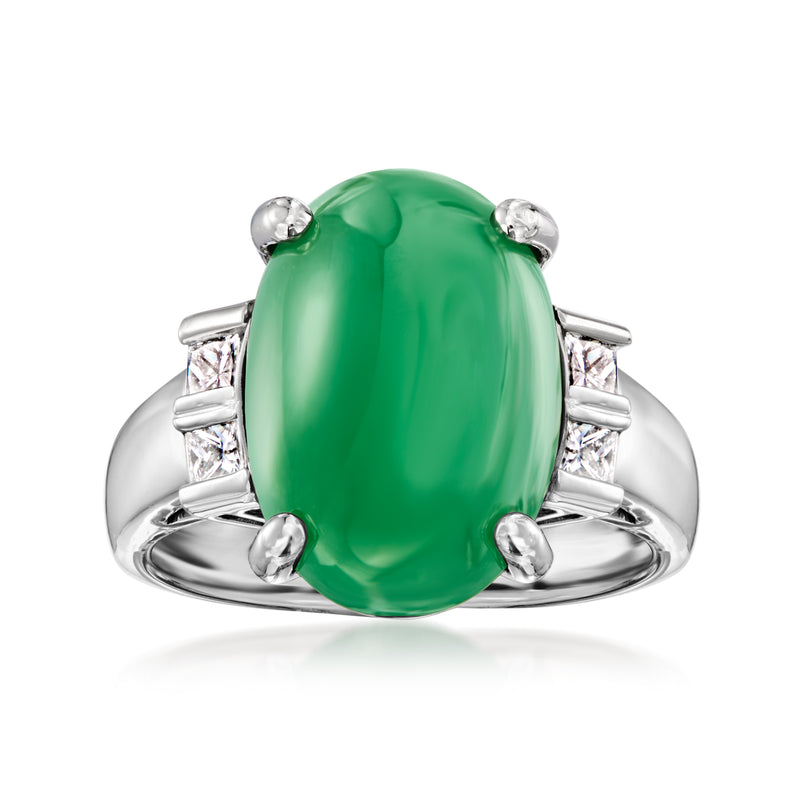 Vintage jade ring in platinum with oval green jade center and diamond side stones
