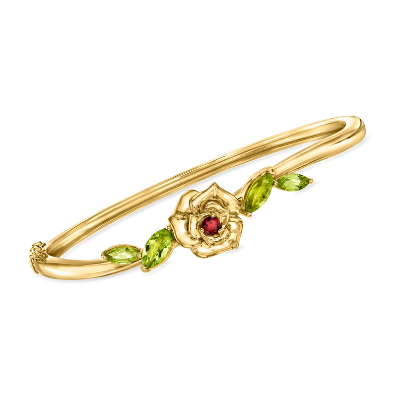 18kt gold over sterling flower bangle bracelet with green peridot and red garnet accents