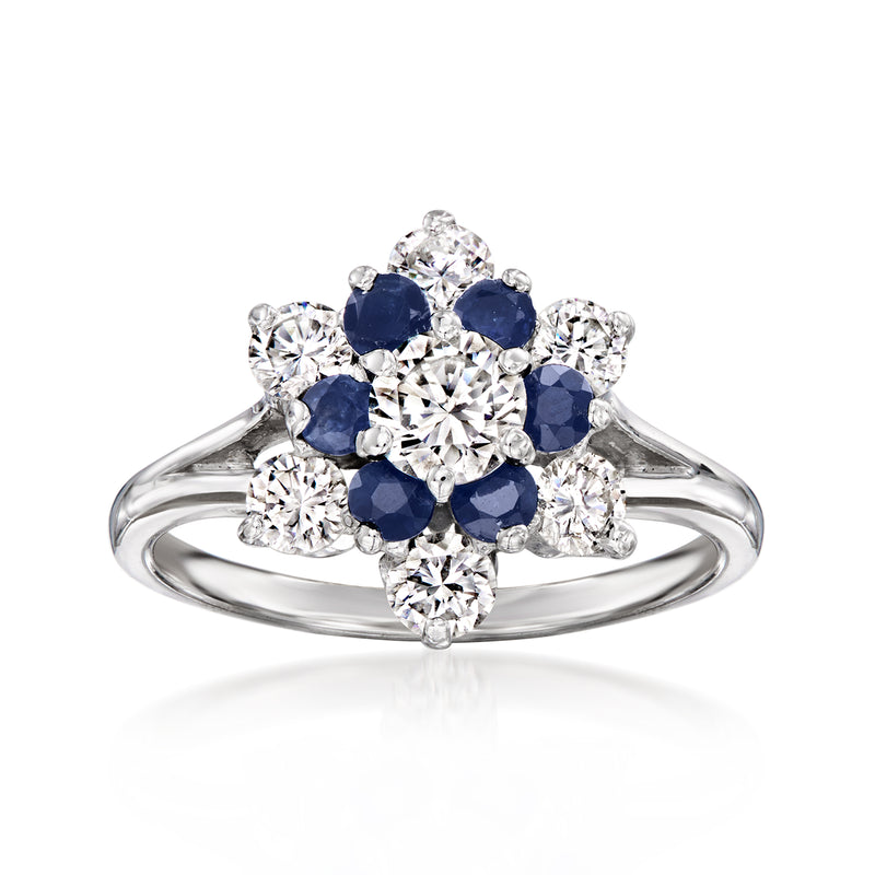 14kt white gold cluster ring with round diamonds and blue sapphire accents