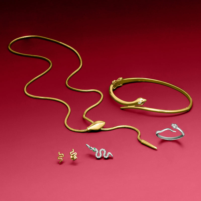 Snake bypass gold vermeil bangle bracelet with single lab-grown diamond, curved motif