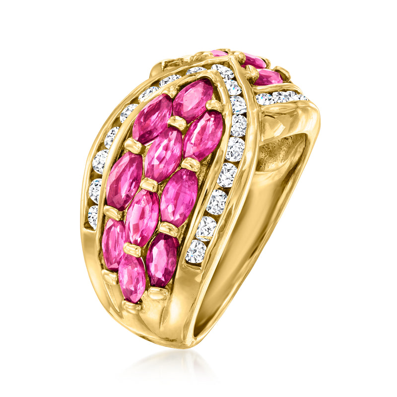 18kt yellow gold ring with large oval pink ruby center and diamond halo border