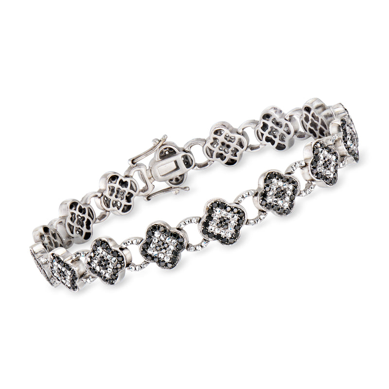 Vintage black-and-white diamond tennis bracelet in white gold, cushion stations