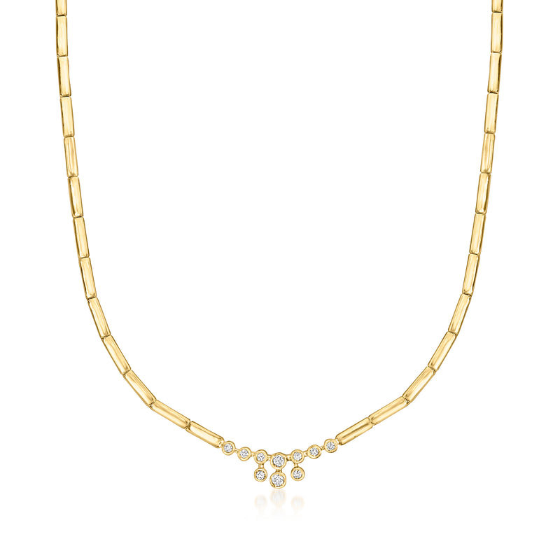18kt yellow gold diamond necklace with round stones and small center cluster