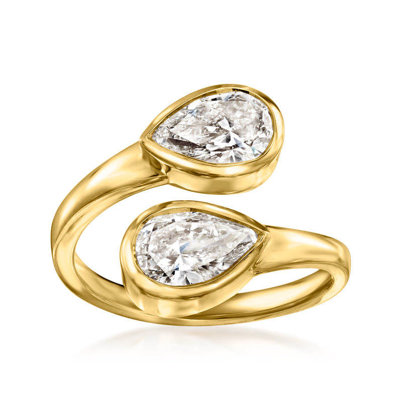 Yellow gold bypass ring with two pear-shaped lab-grown diamonds in bezel settings