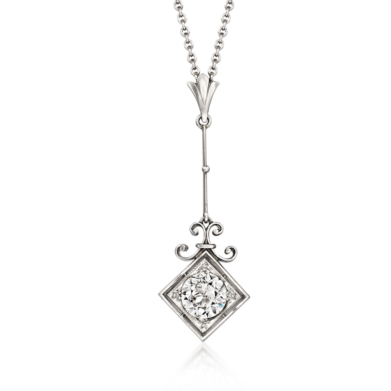 Platinum diamond pendant necklace with square-cut bezel setting and dangling chain