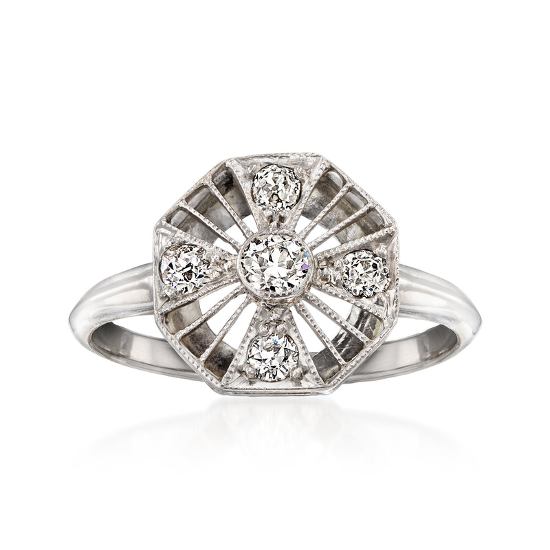 Vintage openwork diamond ring in platinum and 12kt white gold, round center and side stones