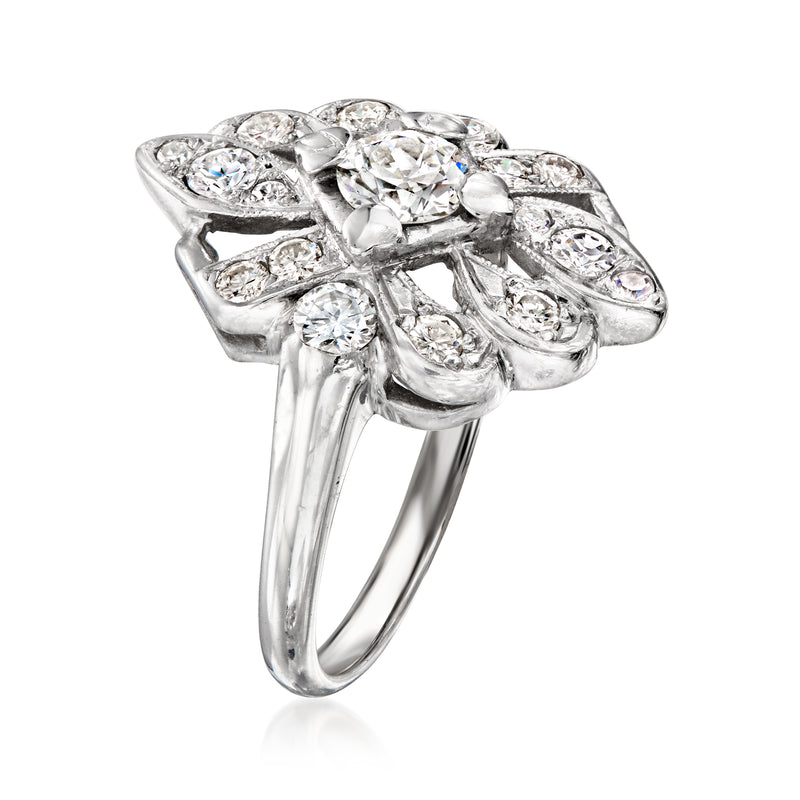 Vintage white gold diamond cluster ring, side view with detailed prong-set stones