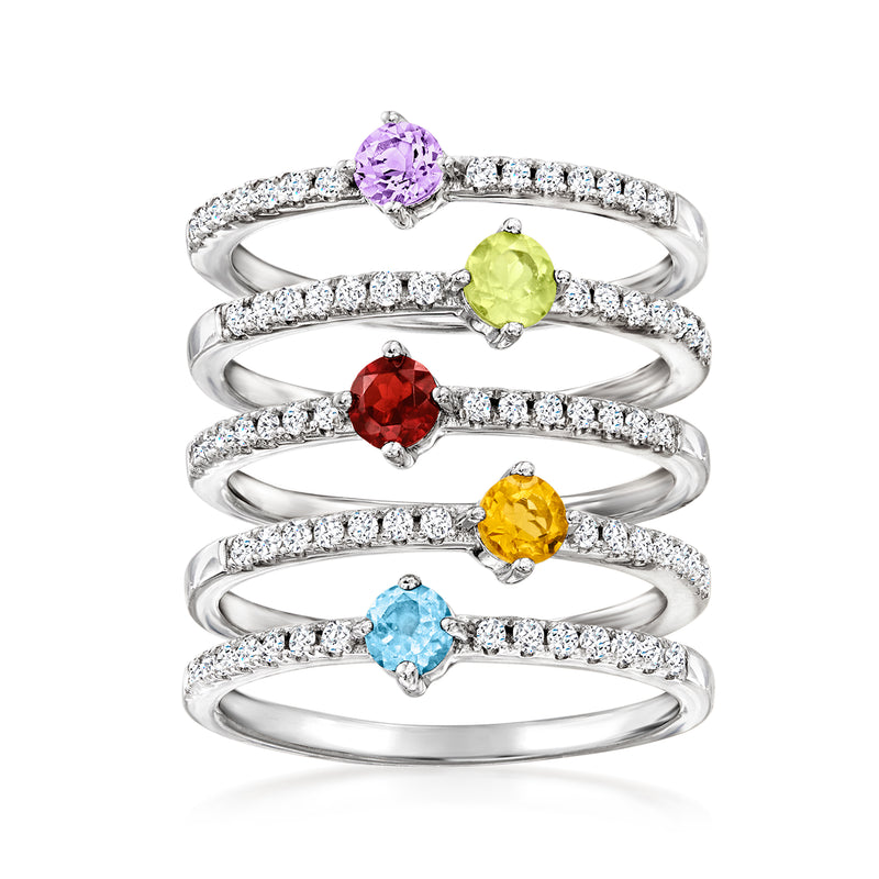 Sterling silver five-ring set with purple, green, red, yellow, and light-blue stones