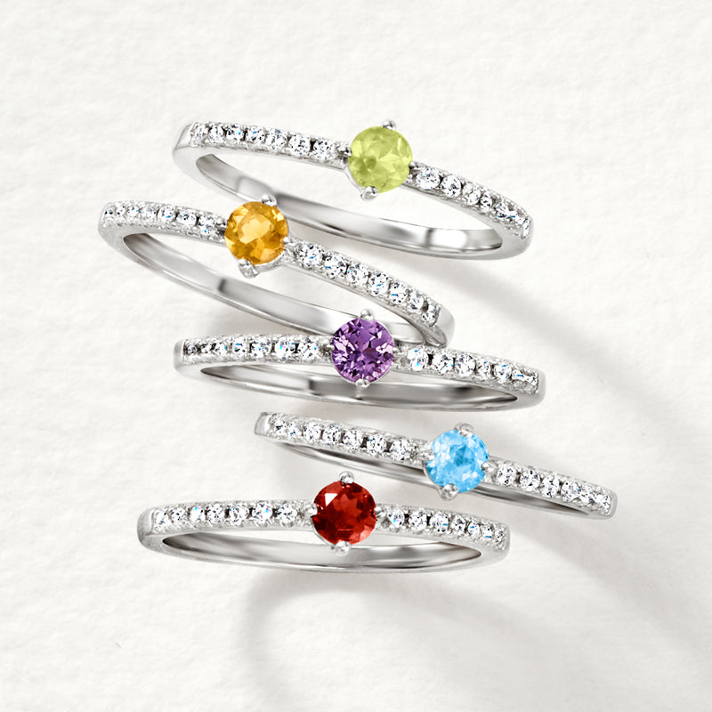 Sterling silver multi-gem ring set with yellow, green, purple, blue, and red gemstone centers