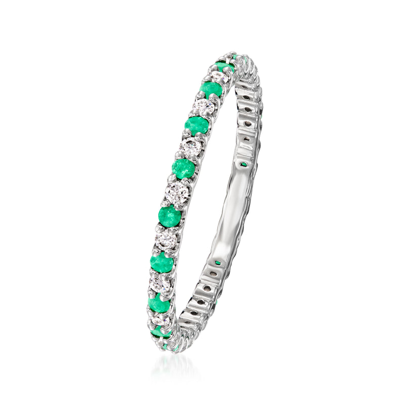Sterling silver eternity band side view with alternating green and clear stones