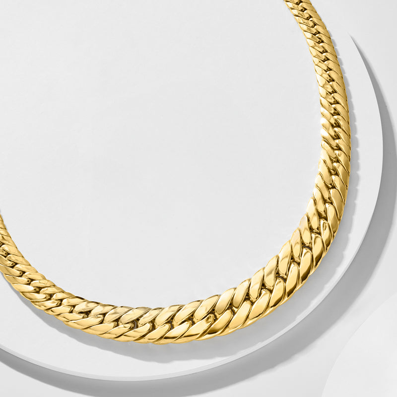 Gold-tone graduated Cuban-link necklace, side view showing interlocking chain links
