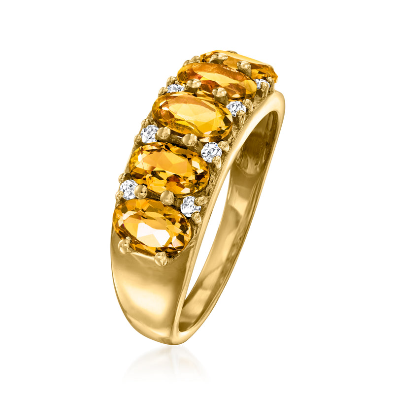 Gold ring with clustered oval citrine stones and white zircon side stones
