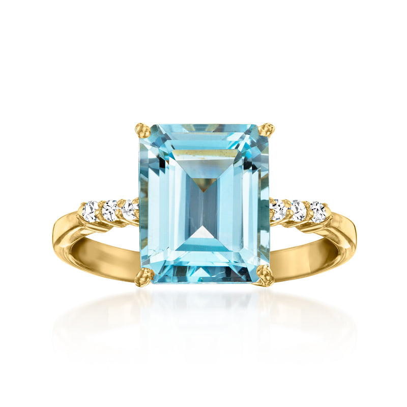 Sky blue topaz ring with white stone accents in 18kt gold over sterling, square cut