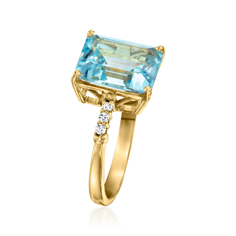 Sky blue topaz ring with small white stones on prongs, 18kt gold over sterling