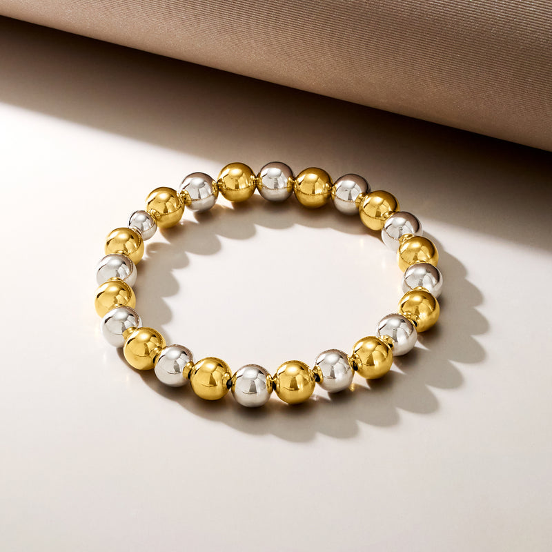 Gold and silver round bead stretch bracelet, close view of bracelet circle