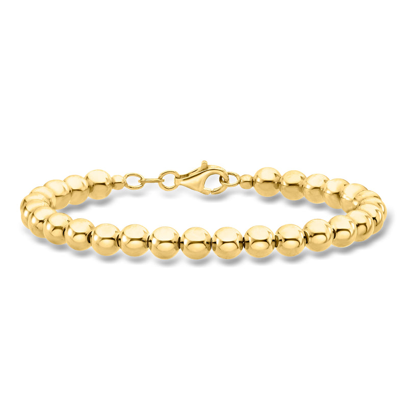 Gold bead bracelet with round polished beads and small chain-link clasp