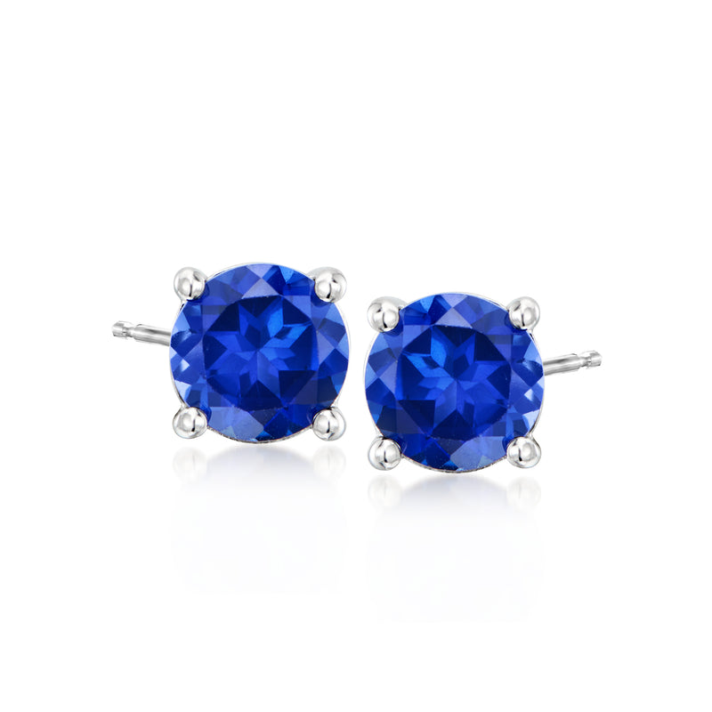 Sterling silver stud earrings with blue simulated round gemstones