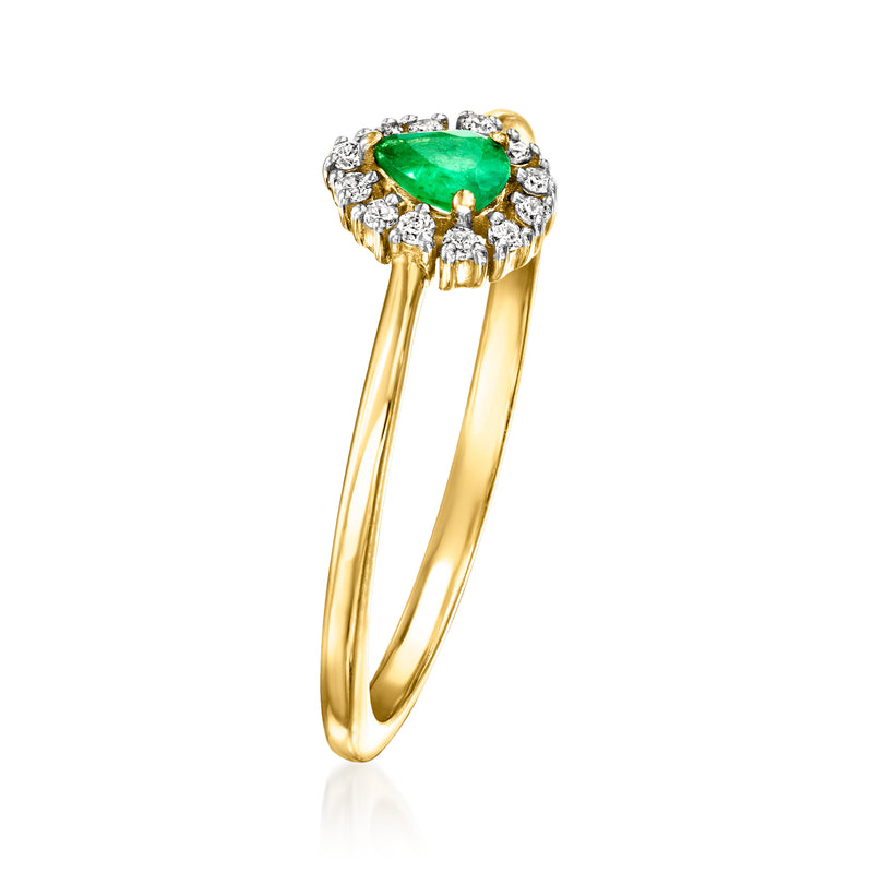 Yellow gold emerald and diamond halo ring, angled side view