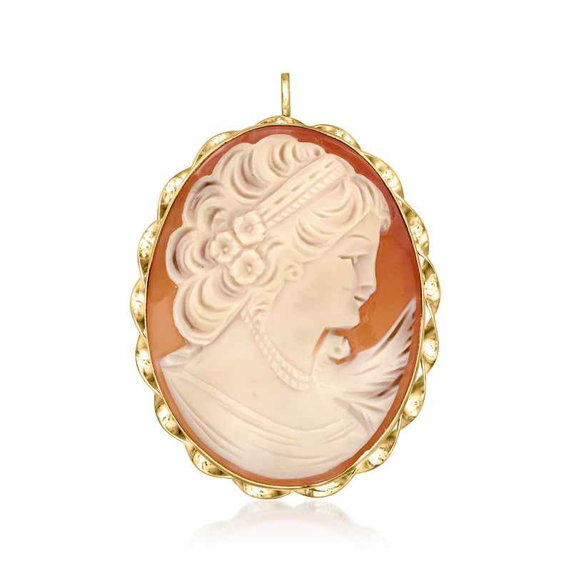 Oval orange shell cameo pendant in 14kt yellow gold, white profile relief and bail