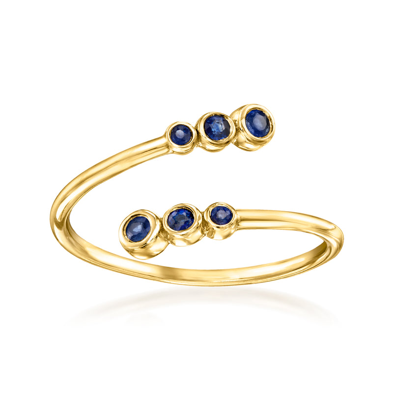 Bypass sapphire ring in 10kt yellow gold with three blue round gemstones