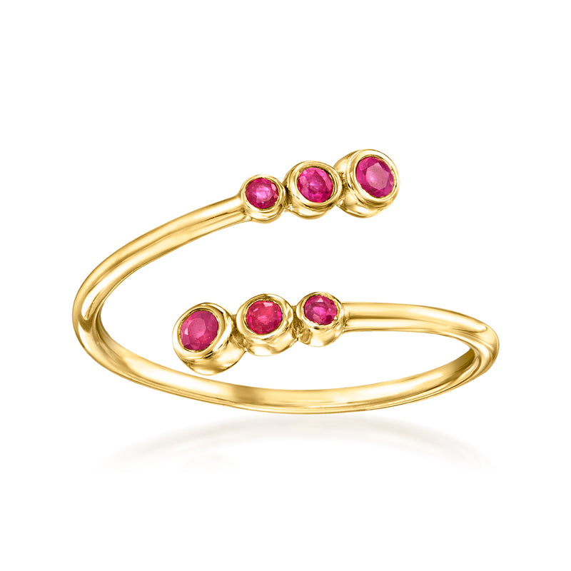 10kt yellow gold ruby bypass ring with three oval ruby stones on open band