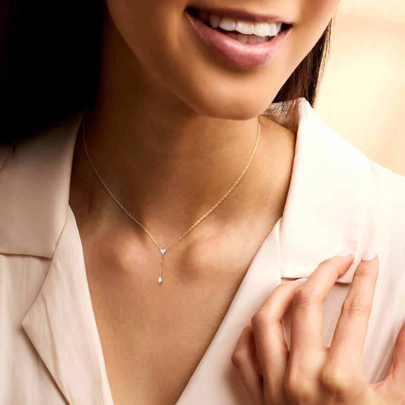 14kt yellow gold Y-necklace worn with heart and marquise lab-grown diamond pendants