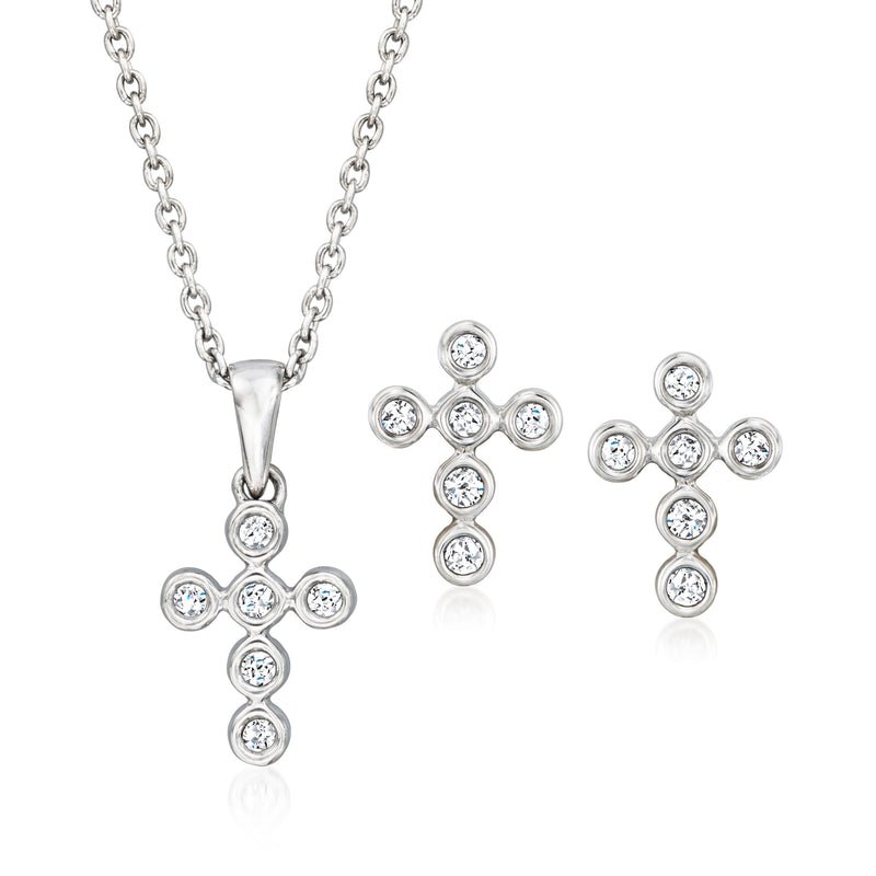 Sterling silver cross pendant necklace and stud cross earrings with round diamond accents