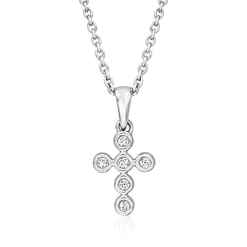 Sterling silver cross pendant necklace with round bezel-set stones on a chain