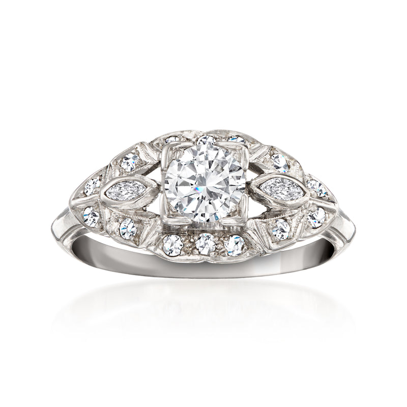 Vintage 0.75 ct. diamond ring in 18kt white gold with halo setting