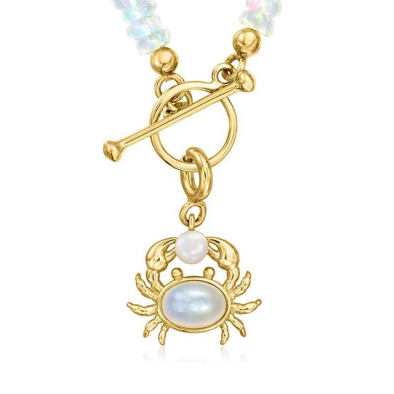 Gold over sterling crab charm with mother-of-pearl oval, white center pearl, top loop