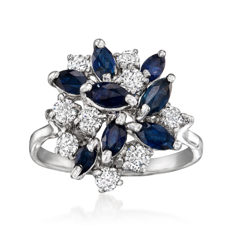 14kt white gold cluster ring with blue oval sapphires and round diamonds