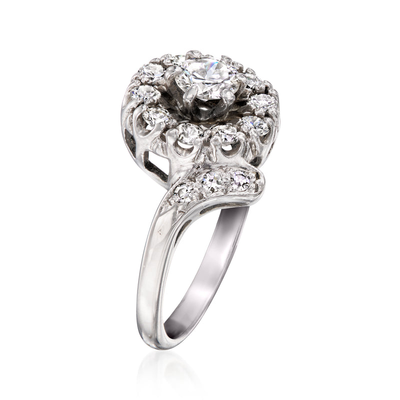 White gold diamond cluster ring, side view with raised halo and prongs