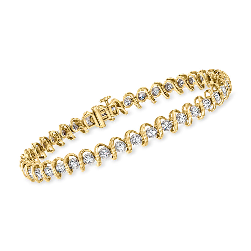 Vintage diamond tennis bracelet in 14kt yellow gold with round prong-set stones