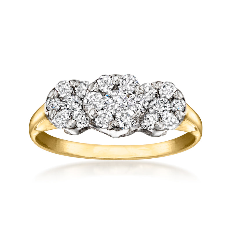 Yellow gold diamond cluster ring with oval center and round side stones