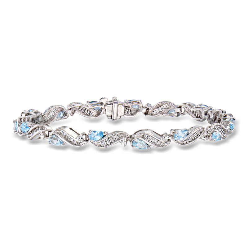 Vintage white gold bracelet with blue gemstones and diamond accents, hinged clasp