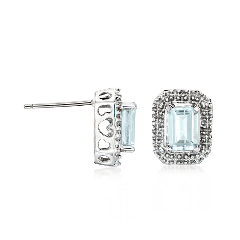 C. 2000 aquamarine post earrings in 10kt white gold, halo setting