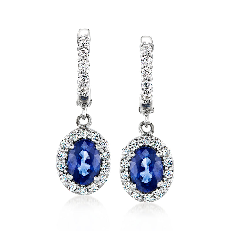 14kt white gold sapphire and diamond hoop drop earrings, blue oval stones in halo settings