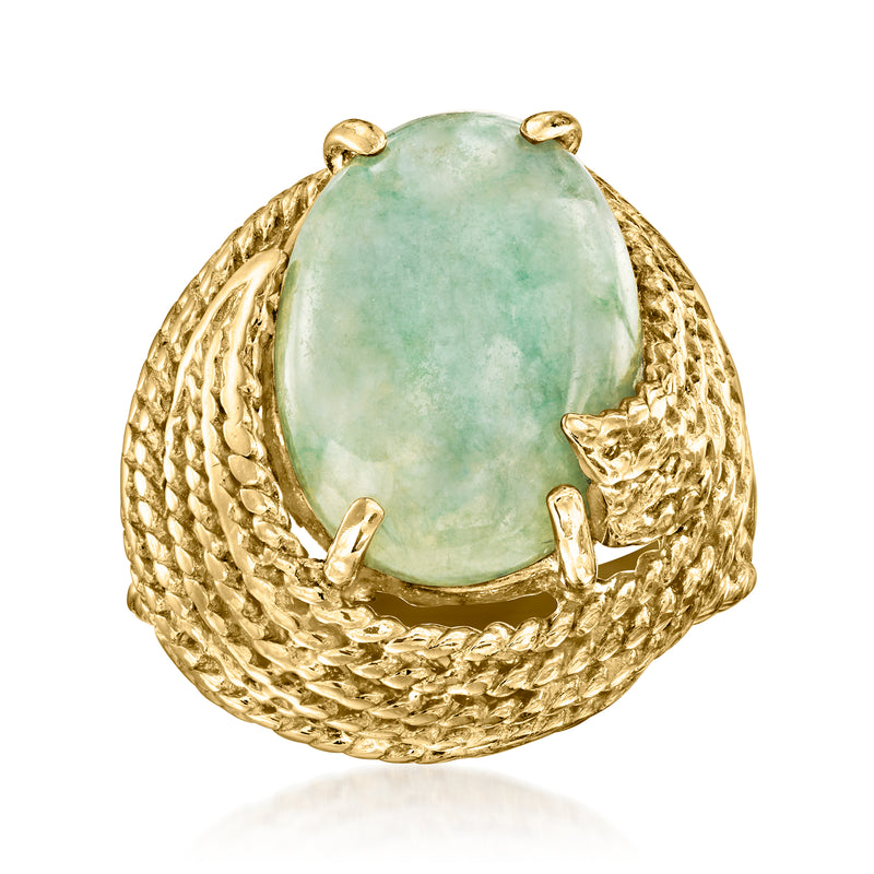 Vintage jade swirl ring in 14kt yellow gold with oval light green cabochon