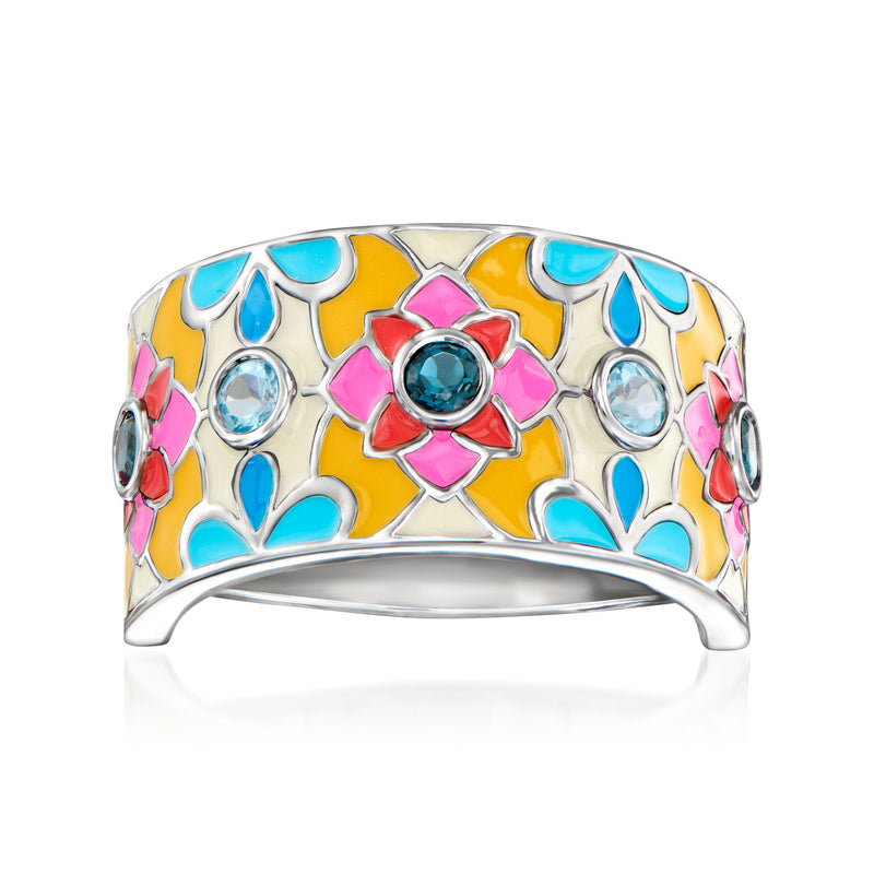 Sterling silver floral ring with multicolored enamel and blue center topaz