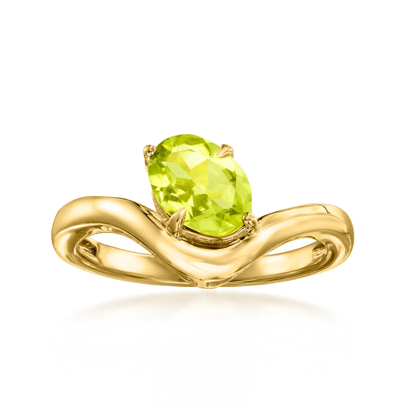 Curved 18kt gold over sterling ring with oval peridot green gemstone and open design
