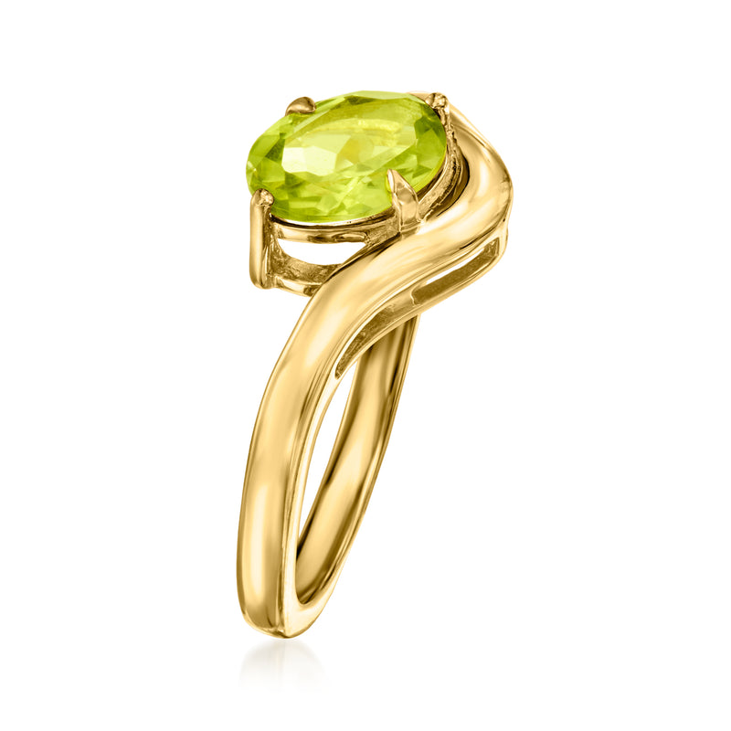 Curved gold over sterling ring with large oval green gemstone and open side band