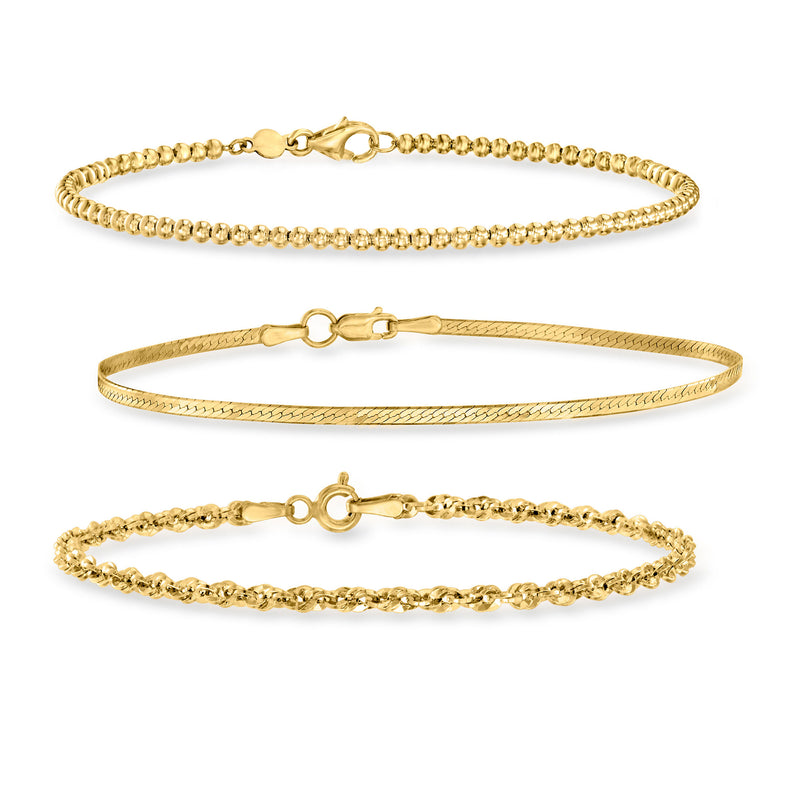 14k yellow gold three-chain bracelet set with bead, herringbone, and rope links