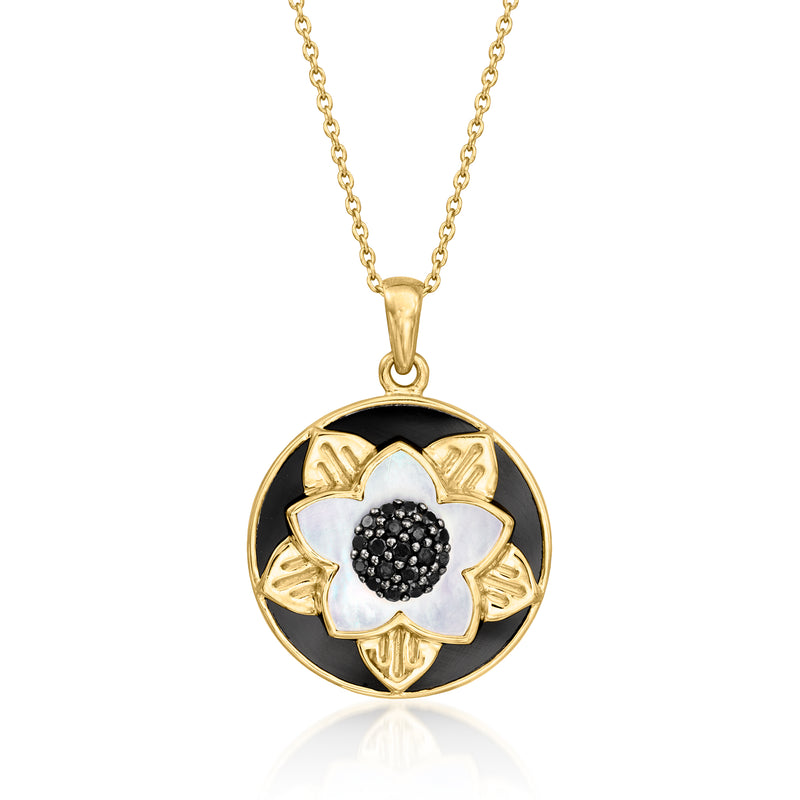 Gold pendant necklace with black center flower and mother-of-pearl petals, round frame