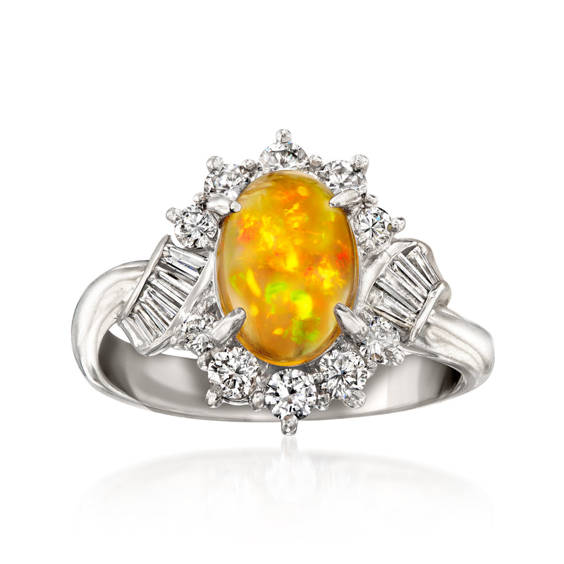 Platinum vintage ring with oval yellow opal center and round diamond halo, baguette sides